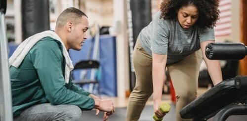 a personal trainer giving a training session