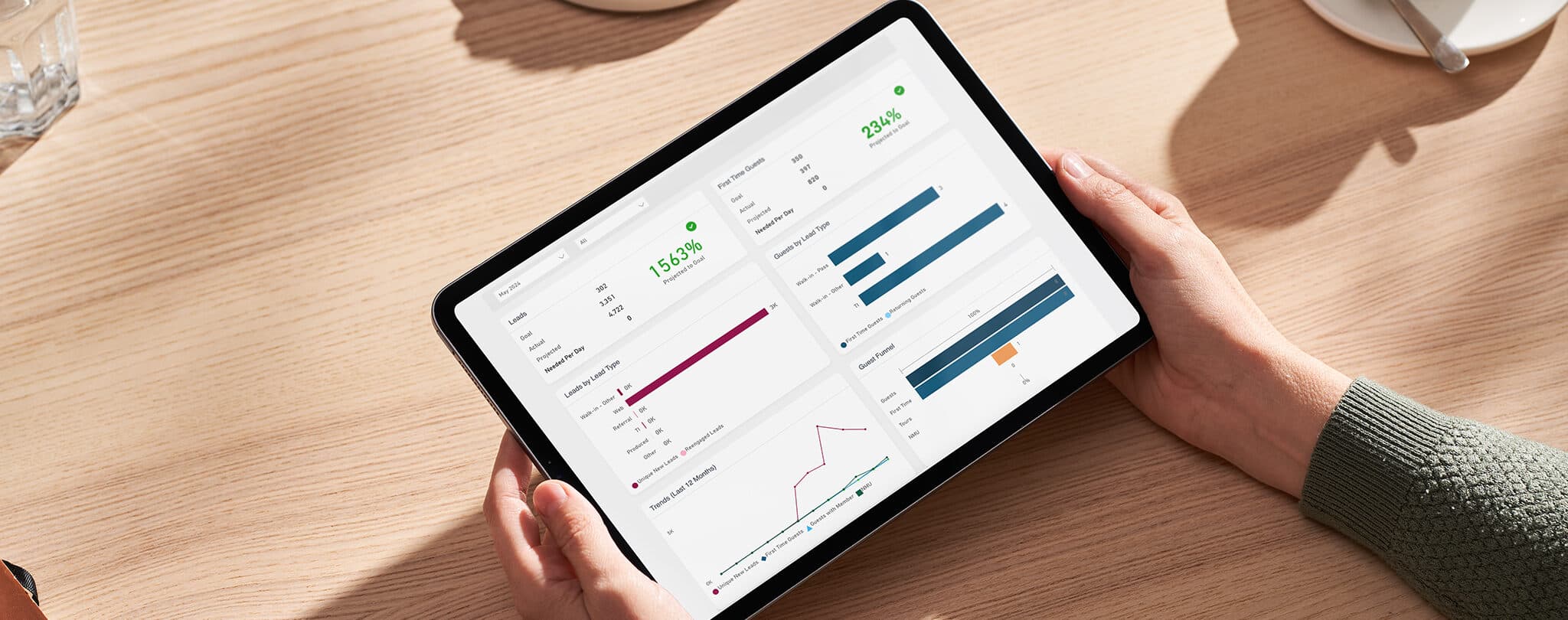 a person checking growth on their tablet