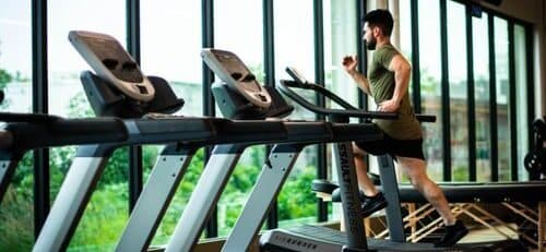 a person on a treadmill at the gym