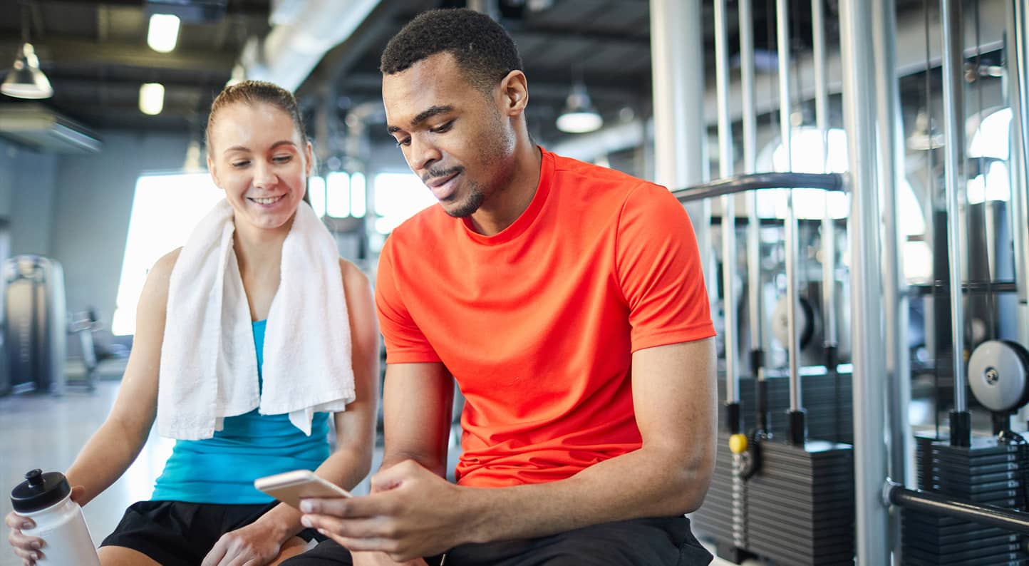A member and a staff member talking